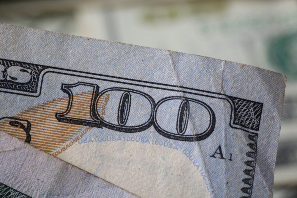 visa direct vs swift a close up of a hundred dollar bill